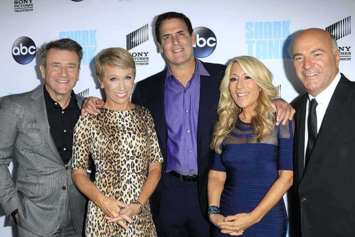 Robert Herjavec, Barbara Corcoran, Mark Cuban, and Lori Greiner posing together at an event
