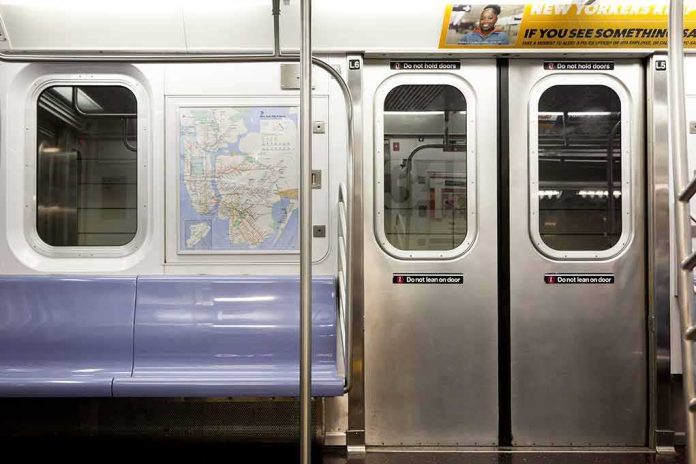 shutterstock_573186778-1 Subway car interior with stainless doors and empty blue bench