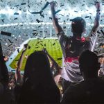 Protocol Shattered: Trump Grabs The Cup Fans celebrate in a packed stadium with confetti falling