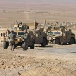 The Airstrike That Killed Lebanese Army Officers — And What Israel Said Soldiers near armored vehicles in a desert