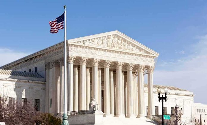 United States Supreme Court building with flag