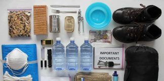 Emergency kit items organized on a white surface