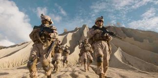 Egypt’s War Room Moves – Parliament Stalls Soldiers in desert gear patrol a rocky landscape