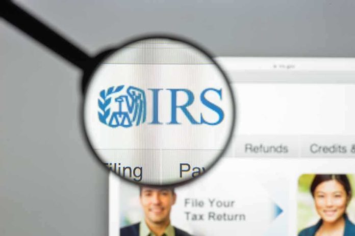 shutterstock_696480121 Magnifying glass highlighting IRS logo on a website